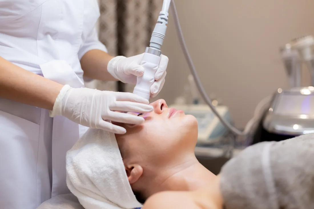 Client receiving a facial rejuvenation treatment